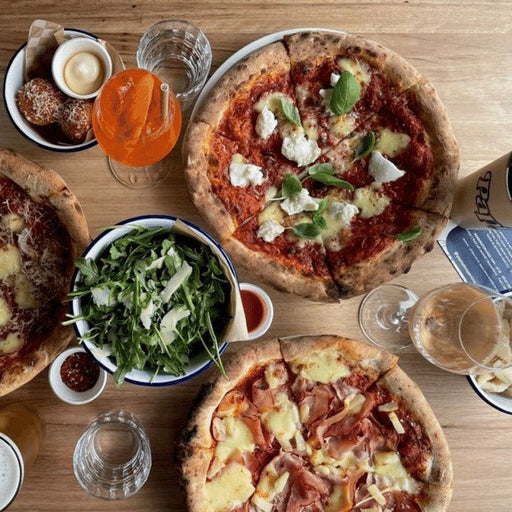 A Grand Pizza & Wine Signature At Papi's Pizza - We Wander