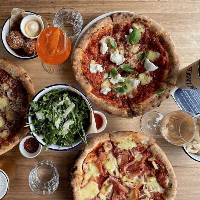 A Grand Pizza & Wine Signature At Papi's Pizza - We Wander